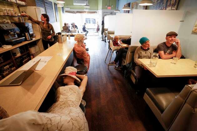 (200615) -- VANCOUVER, June 15, 2020 (Xinhua) -- Mannequins are used to block off seats at Roundel Cafe to give diners enough physical distance in Vancouver, British Columbia, Canada, on June 15, 2020. As restaurants were reopened under health safety protocols in Vancouver, the restaurant Roundel Cafe found its way by using mannequins instead of cordoned-off seats to help diners practice physical distancing. (Photo by Liang Sen Xinhua) CANADA-VANCOUVER-COVID-19-RESTAURANT-PHYSICAL DISTANCE 