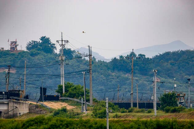 June 18, 2020, Paju, GYEONGGI, SOUTH KOREA: June 18, 2020-Paju, South Korea-A View scene of North Korean Village s Gaepyeong-Gun in Kaesong, North Korea. North Korea appears to have dispatched soldiers to some empty guard posts inside the Demilitarized Zone, sources said Thursday, following its warnings that it would beef up its military presence in border areas. On Wednesday, the General Staff of the (North) Korean People s Army vowed to set up civil police posts, which had been withdrawn from the DMZ under an inter-Korean military agreement, as part of next steps against South Korea after the demolition of the inter-Korean liaison office in the border town of Kaesong. Paju SOUTH KOREA - ZUMAr168 20200618_zap_r168_001 Copyright: xRyuxSeung-Ilx