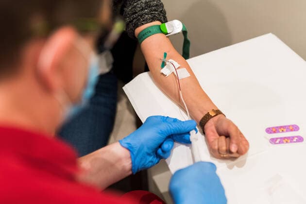 Corona antibody test 15 06 2020 Frankfurt x1x Corona antibody test for everyone in the Intercity Hotel must not be mentioned In the picture A woman gets her blood drawn Frankfurt Frankfurt Hessen Germany