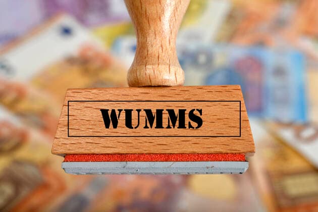 Symbol image economic stimulus package during Corona crisis, stamp with inscription WUMMS, Germany Symbol image stamp
