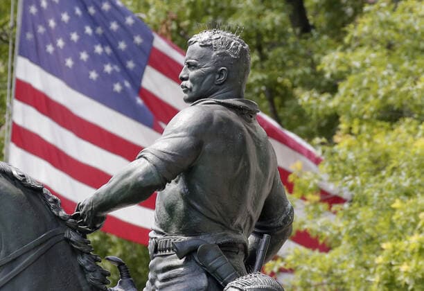 Police barricades surround the area around a bronze statue of former President Theodore Roosevelt at the American Museum Of Natural History in New York City on Monday, June 22, 2020. The statue of the 26th president flanked by walking Native American and African figures was unveiled to the public in front of the museum s Central Park West entrance in 1940. Statues in the United States and around the world have been knocked down, removed and vandalized as a debate swirls over monuments that represent possible racial oppression.  NYP20200622104 JOHNxANGELILLO