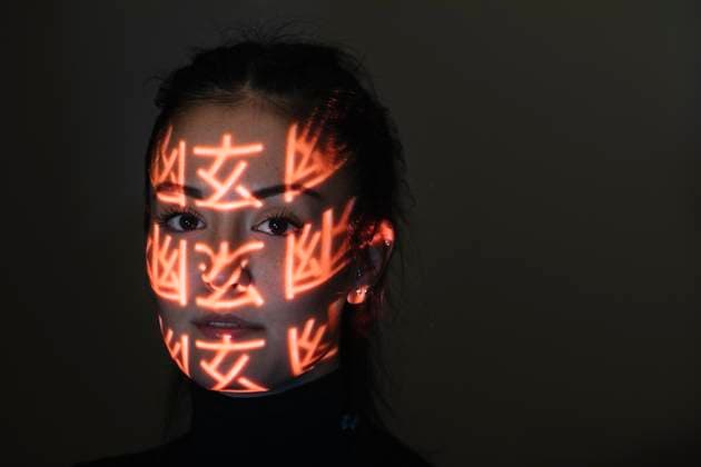 Face of beautiful woman covered in light patterns model released Symbolfoto property released ALBF01207