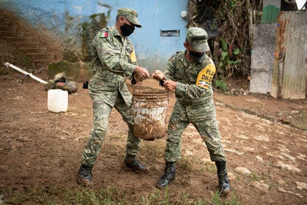 June 25, 2020, Xalapa, Veracruz, Mo xico: Members of the Mexican army help families affected by the landslides that have occurred since June 24. The damage so far is incalculable. Xalapa MÃ xico - ZUMAqp1_ 20200625_zip_qp1_010 Copyright: xHectorxAdolfoxQuintanarxPerezx