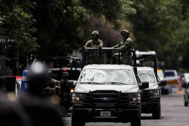 (200627) -- MEXICO CITY, June 27, 2020 (Xinhua) -- Soldiers stand guard around the hospital where Mexico City Chief of Police Omar Garcia Harfuch is treated after being attacked by gunmen in Mexico City, Mexico, June 26, 2020. A group of gunmen opened fire on Mexico City Chief of Police Omar Garcia Harfuch and his bodyguards on Friday morning, injuring him and killing two officers and a civilian, according to local authorities. (Photo by Francisco Canedo Xinhua) MEXICO-MEXICO CITY-POLICE CHIEF-ATTACK 
