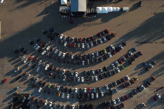 ST PETERSBURG, RUSSIA - JUNE 28, 2020: An aerial view of vehicles during a drive-in concert in support of doctors at the Osinovaya Roshcha logistics park. Peter Kovalev TASS  TS0DE6DB