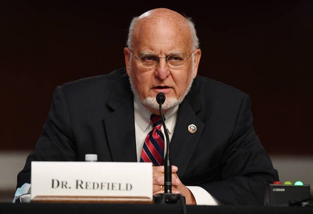 (200630) -- WASHINGTON, June 30, 2020 -- Robert Redfield, director of the U.S. Centers for Disease Control and Prevention, testifies before the U.S. Senate Committee on Health, Education, Labor and Pensions on COVID-19: Update on Progress Toward Safely Getting Back to Work and Back to School in Washington, D.C., the United States, on June 30, 2020. Anthony Fauci, the U.S. government s top infectious-diseases expert, warned Tuesday that COVID-19 cases in the United States could go up to 100,000 per day if the current trend does not turn around. ( Pool via Xinhua) U.S.-WASHINGTON, D.C.-SENATE-HEARING-COVID-19 KevinxDietsch