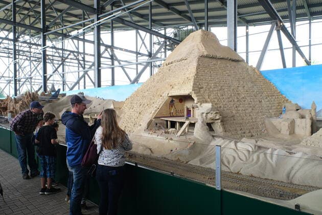 Snow Dome Modellbau Welten Bispingen Visitors in front of Egyptian pyramids The largest model railway in the world opened today in Bispingen with 12,000 square metres of space, 20 kilometres of track laid, 500 trains and 50 theme worlds, the Modellbau W
