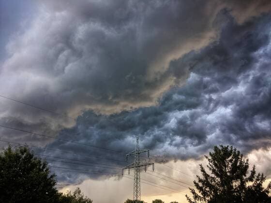 July 1, 2020, Munich, Bavaria, Germany: Dark, ominous storm clouds hover over Munich bringing thunder, lighting, and rain behind. Munich Germany - ZUMAb160 20200701_zbp_b160_001 Copyright: xSachellexBabbarx