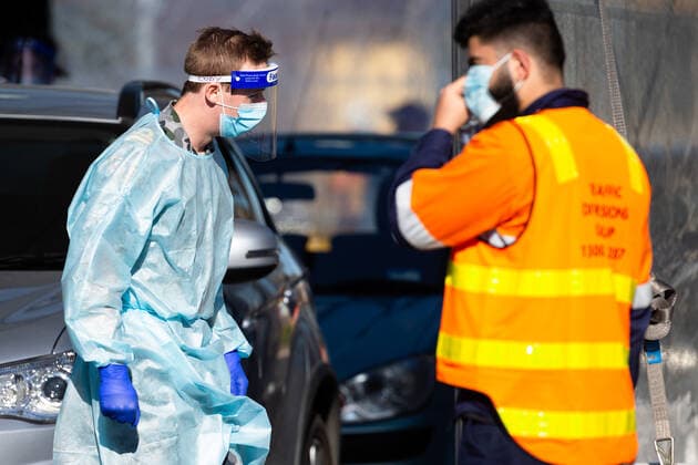 July 1, 2020, Melbourne, VIC, USA: MELBOURNE, AUSTRALIA - JULY 01: An ADF Officer is seen wearing full PPE in the Fawkner Mobile Testing Site as the military has been called in to assist civilian doctors administer up to 20,000 tests per day as 36 Melbourne suburbs go back into strict lockdown in Victoria during COVID 19 on 1 July, 2020 in Melbourne, Australia. Victoria is suffering from a sustained increase in new infections amid a record testing blitz of 20,000 tests per day in Melbourneâ€⠢s hotspots. Victoria has recorded 73 new coronavirus cases overnight which brings the total active cases up to 370 since Thursday 25 June. The State Premier, Daniel Andrews announced on Tuesday 30 June that 36 Melbourne suburbs will again be forced - ZUMAi88_ 20200701_zaf_i88_017 Copyright: xSpeedxMediax