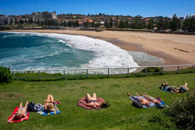 The Bondi beach to Coogee walk is a coastal walk in Sydney New South Wales, Australia. Sunbath in Coogee beach Dolphins Point and Giles Baths Sydney New South Wales Australia Copyright: xSergixReboredox SRE-065-EJ3783