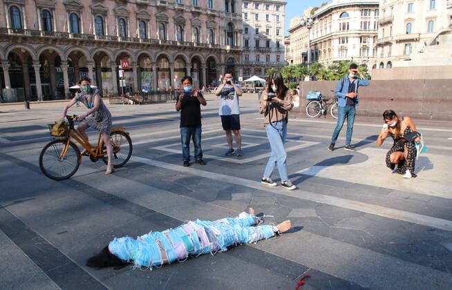 photo ipp clemente marmorino milano 09 07 2020 artistic performance for the coronavirus emergency in the photo a chinese artist dressed entirely with surgical masks in piazza duomo  0