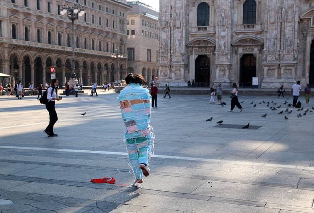 photo ipp clemente marmorino milano 09 07 2020 artistic performance for the coronavirus emergency in the photo a chinese artist dressed entirely with surgical masks in piazza duomo  0