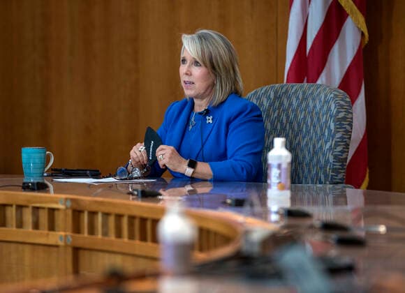 July 9, 2020, USA: Governor Michelle Lujan Grisham announces some return to closures and face mask will be required any time someone leaves the home. This was during her weekly update on the COVID-19 outbreak in New Mexico and the state effort to control it. The news conference is being held at the Roundhouse in Santa Fe, Thursday July 9, 2020. USA - ZUMAab1_ 20200709_zaf_ab1_013 Copyright: xEddiexMoorex
