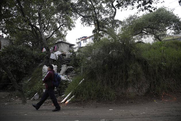 A man walks past the house where there was a multi-femicide. The bodies of 4 girls and one woman lifeless with gun shot wounds were found in the El Gavillero neighbourhood in northeast of Mexico City on July 8th, 2020 in Nicolas Romero, Mexico Where: Nicolas Romero, Mexico When: 09 Jul 2020 Credit: Eyepix Cover Images **EDITORIAL USE ONLY** Copyright: xMarianaxBaex 40706320 EDITORIAL USE ONLY. NOT FOR USE BY NEWSPAPERS BASED IN THE UK.