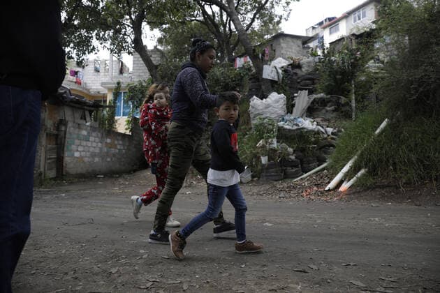 People walk past the house where there was a multi-femicide. The bodies of 4 girls and one woman lifeless with gun shot wounds were found in the El Gavillero neighbourhood in northeast of Mexico City on July 8th, 2020 in Nicolas Romero, Mexico Where: Nicolas Romero, Mexico When: 09 Jul 2020 Credit: Eyepix Cover Images **EDITORIAL USE ONLY** Copyright: xMarianaxBaex 40706324 EDITORIAL USE ONLY. NOT FOR USE BY NEWSPAPERS BASED IN THE UK.