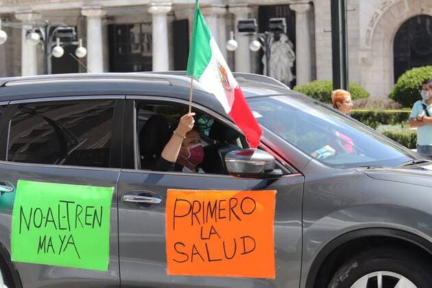 A woman holds Mexico s flag duirng a rally against Mexican President Andres Manuel Lopez Obrador in Mexico City, Mexico, 12 July 2020. Protest against Mexican President !ACHTUNG: NUR REDAKTIONELLE NUTZUNG!  Copyright: xJoséxPazosx MEX4102 20200712-637301848858435908