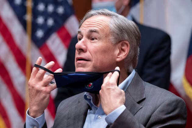 July 16, 2020, Austin, Texas, USA: Texas Governor GREG ABBOTT puts on a face mask during a press conference with U.S. Secretary of Agriculture Sonny Perdue at the Texas Capitol on July 16, 2020. Abbott reviewed the state s response to growing pandemic case numbers and rising deaths in Texas. Austin USA - ZUMAd150 20200716_znp_d150_016 Copyright: xBobxDaemmrichx