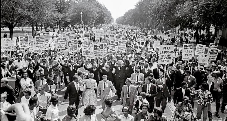 Leaders of the 1963 March on Washington for Jobs and Freedom raise their hands together as they move along Constitution Avenue in Washington, D.C. on August 28, 1963. Some of the leaders in the march, from left to right, include John Lewis, Mathew Ahmann, Roy Wilkins, Dr. King, Rabbi Joachim Prinz, A. Philip Randolph, and Whitney Young. Copyright: xCNP MediaPunchx