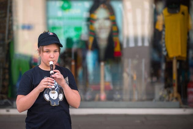 (200718) -- VILNIUS, July 18, 2020 (Xinhua) -- A girl performs during the Street Music Day event in Vilnius, Lithuania, on July 18, 2020. Professional and amateur musicians performed in the streets and parks in the old town of Vilnius to celebrate Street Music Day on Saturday. (Photo by Alfredas Pliadis Xinhua) LITHUANIA-VILNIUS-STREET MUSIC DAY 