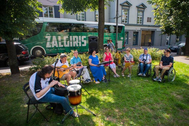 (200718) -- VILNIUS, July 18, 2020 (Xinhua) -- People perform during the Street Music Day event in Vilnius, Lithuania, on July 18, 2020. Professional and amateur musicians performed in the streets and parks in the old town of Vilnius to celebrate Street Music Day on Saturday. (Photo by Alfredas Pliadis Xinhua) LITHUANIA-VILNIUS-STREET MUSIC DAY 
