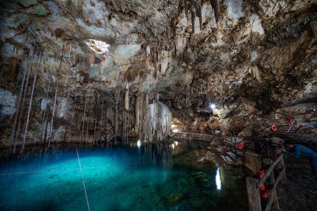 Stalagtite mineral formations over Cenote Xkeken near Dzitnup, Yucatan, Mexico. The Mayans believed these underground pools were the gateway to the underworld. Dzitnup Yucatan Mexico Copyright: xJonxG.xFullerx JGF-landscapes-cenotes-MX-2134