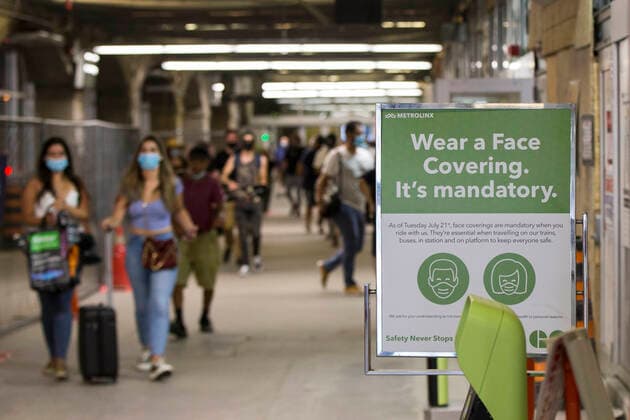 (200721) -- TORONTO, July 21, 2020 -- Passengers wearing face masks are seen at Union Station in Toronto, Canada, on July 21, 2020. Starting Tuesday, Go Transit customers are required to wear masks or face coverings. (Photo by Xinhua) CANADA-TORONTO-COVID-19-MEASURES-GO TRANSIT ZouxZheng 