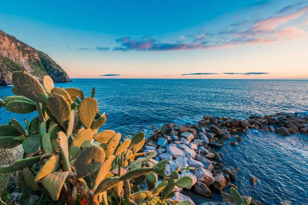 Beautiful Mediterranean sunset in the small town of Rio Maggiore, a five-fishing village in Italy  512346167764189225