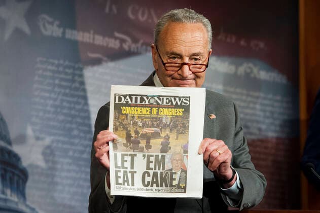 July 28, 2020, Washington, District of Columbia, USA: United States Senate Minority Leader Chuck Schumer (Democrat of New York), holds a copy of the New York Daily News at a press conference to remark on the stimulus and unemployment benefits bill in the US Capitol in Washington, DC., Tuesday, July 28, 2020 Washington USA - ZUMAs152 20200728_zaa_s152_242 Copyright: xRodxLamkeyx