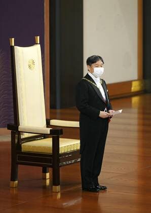 Imperial conferment of decorations Japanese Emperor Naruhito delivers a speech to recipients of grand cordons at the Imperial Palace in Tokyo on July 31, 2020. He wears a face mask amid the novel coronavirus pandemic. (Pool photo) 