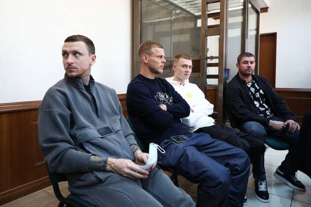 MOSCOW, RUSSIA - JULY 31, 2020: Russian football players Pavel Mamaev, Alexander Kokorin, Kokorin s brother Kirill, and their friend Alexander Protasovitsky (L-R) attend a resentencing hearing in the hooliganism case at the Moscow City Court. Anton Novoderezhkin TASS  TS0E1C58