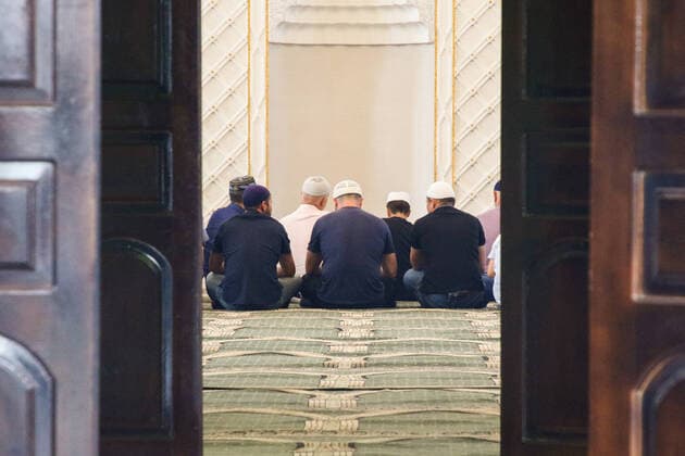 CRIMEA, RUSSIA - JULY 31, 2020: Muslims pray in the Jumah Mosque in Saki to mark the start of Eid al-Adha (or Kurban Bairam, feast of the sacrifice ). Eid al-Adha coincides with the end of Hajj. Alexei Pavlishak TASS  TS0E1BF0