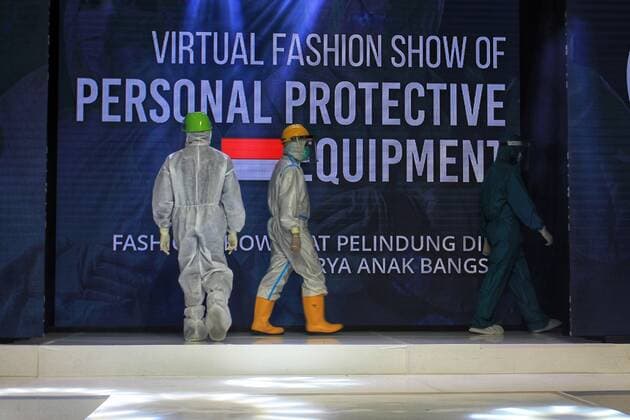 Personal Protective Equipment (PPE) Fashion Show in Yogyakarta Indonesia. A model walks the runway while wearing protective suit (PPE) during the virtual Personal Protective Equipment fashion show, on August 01, 2020 in Yogyakarta, Indonesia. (Photo by Devi Rahman INA Photo Agency imago images) 