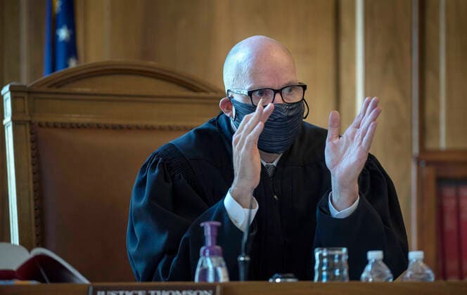 August 4, 2020, USA: Justice David Thomson questions the attorney representing a group that feels the Governor has exceeded her authority in closing businesses across the state due the COVID-19 health emergency. The Supreme Court agreed with the Governor during the healing in Santa Fe Tuesday August 4, 2020. USA - ZUMAab1_ 20200804_zaf_ab1_010 Copyright: xEddiexMoorex