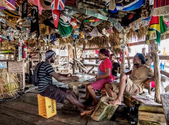 People playing domino at Floyd s Pelican Bar, Saint Elizabeth Parish, Jamaica, West Indies, Caribbean, Central America Copyright: KarolxKozlowski 1245-2044 Editorial Use Only