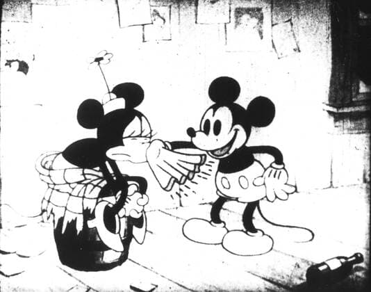 THE KLONDYKE KID MICKEY MOUSE, MINNIE MOUSE THE KLONDYKE KID Date: 1932. Strictly editorial use only in conjunction with the promotion of the film. Credit line mandatory. This image is copyright of the film company and is supplied under the terms of issue as film still. No commercial or book cover use permitted without prior consent from the film company.  Mandatory credit line: Image courtesy WALT DISNEY Ronald Grant Archive Mary Evans