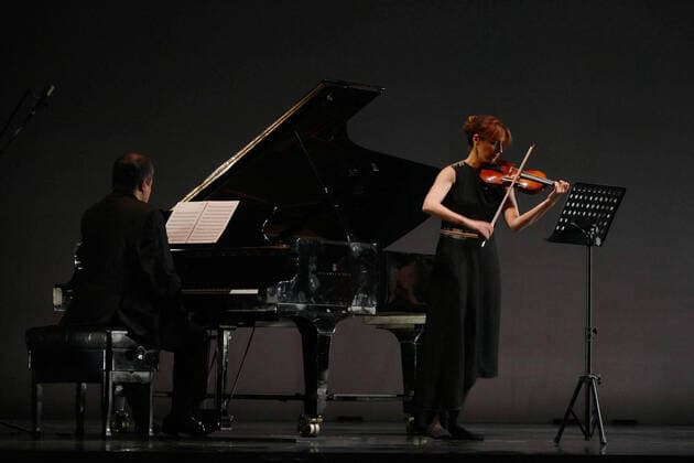 ODESA, UKRAINE - AUGUST 10, 2020 - People s Artist of Ukraine, organiser of the Odessa Classics Festival Alexey Botvinov (L) plays the piano on the stage of the Odesa National Academic Opera and Ballet Theatre as part of the opening of the Odessa Classics 2020 International Music Festival, Odesa, southern Ukraine. Opening of Odessa Classics 2020 Festival  Copyright: xYuliixZozuliax