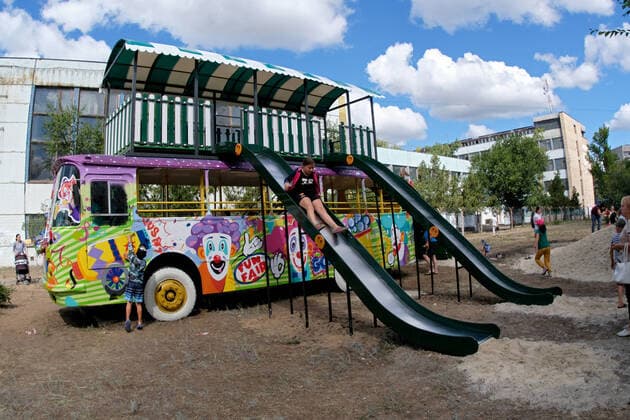 SIEVIERODONETSK, UKRAINE - AUGUST 13, 2020 - A bus has been transformed into a playground in Ivonin Park, Sievierodonetsk, Luhansk Region, eastern Ukraine. Bus gets converted into playground in Sievierodonetsk  Copyright: xKovalyovxOleksiyx