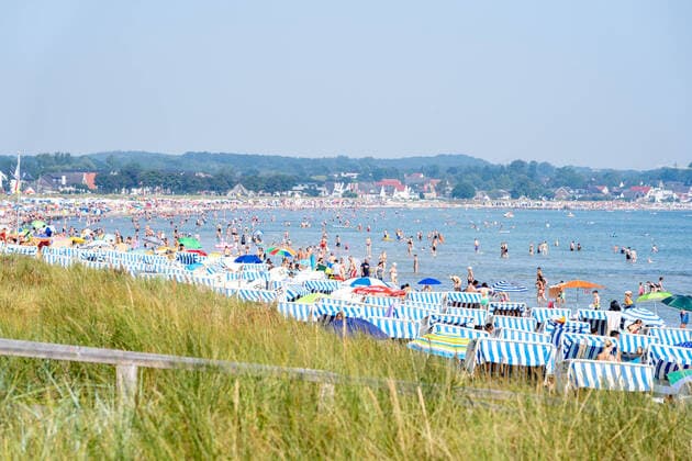 Baltic Sea beach in Scharbeutz and Haffkrug at the Lübeck bay bathers Baltic Sea beach in Scharbeutz and Haffkrug at the Lübeck bay bathers, Scharbeutz Schleswig Holstein Germany promenade and beach