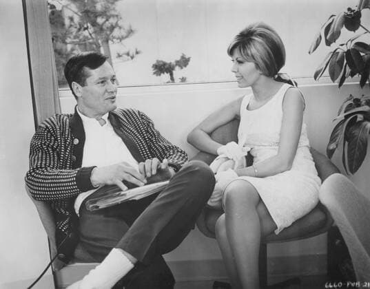 WILD ANGELS DIRECTOR ROGER CORMAN WITH NANCY SINATRA PICTURE FROM THE RONALD GRANT ARCHIVE WILD ANGELS Date: 1966. Strictly editorial use only in conjunction with the promotion of the film. Credit line mandatory. This image is copyright of the film company and is supplied under the terms of issue as film still. No commercial or book cover use permitted without prior consent from the film company.  Mandatory credit line: Image courtesy Ronald Grant Archive Mary Evans
