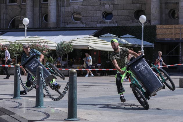 PXL_Garbage man bike race on the streets of Zagreb Traditional garbage-men on bicycles race on the streets of Croatia s capital Zagreb on August 19, 2020 during the 24th Cest is d Best street festival. The winner of this year s race was Gaspar Karamatic, who managed to remove Vanja Lojna from the throne of the champion after ten years. TomislavxMiletic PIXSELL