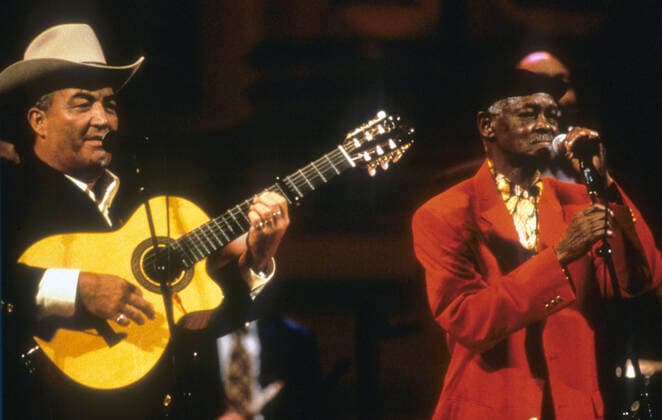 THE BUENA VISTA SOCIAL CLUB ELIADES OCHOA, IBRAHIM FERRER Date: 1999. Strictly editorial use only in conjunction with the promotion of the film. Credit line mandatory. This image is copyright of the film company and is supplied under the terms of issue as film still. No commercial or book cover use permitted without prior consent from the film company.  Mandatory credit line: Image courtesy ROAD MOVIES FILMPRODUKTION KINTOP PICTURES ICAIC ARTE