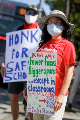 (200829) -- VANCOUVER, Aug. 29, 2020 -- People attend the Safe September rally in Vancouver, British Columbia, Canada, on Aug. 29, 2020. A group of teachers and parents rallied Saturday demanding the province of British Columbia rethink its back-to-school plans. (Photo by Xinhua) CANADA-VANCOUVER-COVID-19- SAFE SEPTEMBER RALLY LiangxSen 