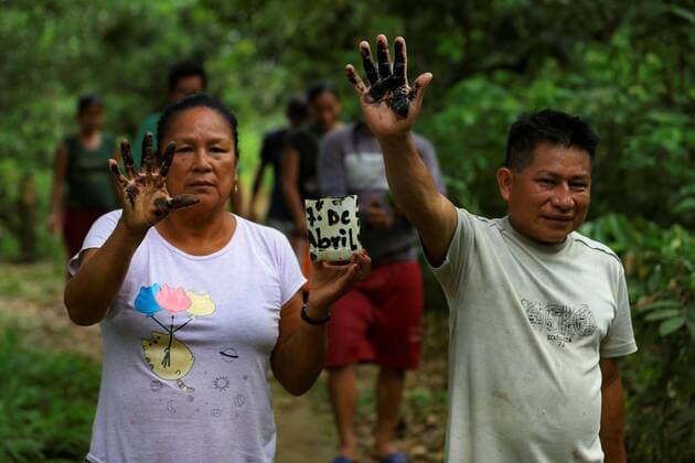 Indigenous people from the Amarumesa community show oil residues in their hands in the city of Francisco de Orellana, Ecuador, 31 August 2020. It happened on April 7 when, some 80 kilometers upriver, near the slopes of the Reventador volcano, three ducts of two oil pipelines that go from the Amazon, in the east, to the Ecuadorian coast, broke due to a landslide in a highly seismic and eroded region. Victims of spill in Ecuador s Amazon clamor for a just sentence !ACHTUNG: NUR REDAKTIONELLE NUTZUNG!  Copyright: xJosexJacomex AME1727 20200901-637345189619950095