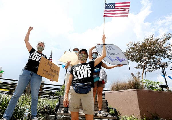 September 2, 2020, Wilmington, North Carolina, USA: Black Lives Matter advocates protest the visit of President Donald Trump to Wilmington, NC on Wednesday to declare the city an American World War II Heritage City, making it the first in the country. The president was expected to meet with veterans, tour the Battleship North Carolina and speak about WilmingtonÃ¢â‚¬â ¢s part in World War II. This was the PresidentÃ¢â‚¬â ¢s 12th visit to North Carolina. Wilmington USA - ZUMAk251 20200902_znp_k251_007 Copyright: xBobxKarpx