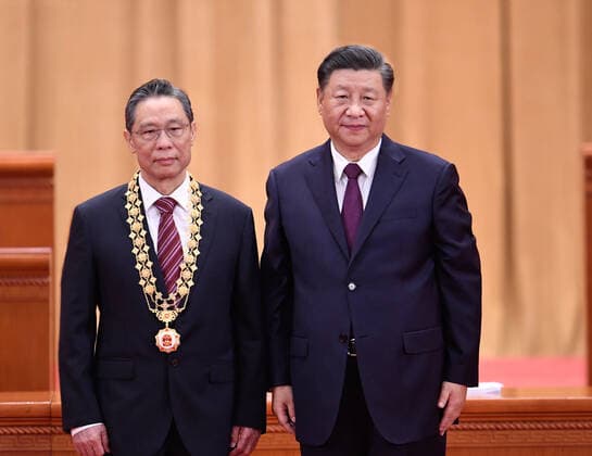 (200908) -- BEIJING, Sept. 8, 2020 -- Chinese President Xi Jinping, also general secretary of the Communist Party of China Central Committee and chairman of the Central Military Commission, presents the Medal of the Republic to Zhong Nanshan during a meeting commending role models in the country s fight against the COVID-19 epidemic at the Great Hall of the People in Beijing, capital of China, Sept. 8, 2020. ) CHINA-BEIJING-COVID-19 FIGHT-ROLE MODELS-COMMENDATION MEETING (CN) ShenxHong 