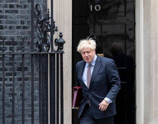 (200910) -- LONDON, Sept. 10, 2020 -- British Prime Minister Boris Johnson leaves 10 Downing Street for the House of Commons in London, Britain, Sept. 9, 2020. The British government on Wednesday published a controversial bill which overrides elements of the Brexit deal with Brussels, despite a senior minister explicitly acknowledging that the plan would break international law . ) BRITAIN-LONDON-PM-NEW BILL HanxYan 