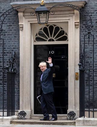 (200910) -- BEIJING, Sept. 10, 2020 -- British Prime Minister Boris Johnson walks back to 10 Downing Street in London, Britain, Sept. 8, 2020. Crucial talks aimed at finding a post-Brexit trade deal between Britain and the European Union (EU) opened Tuesday in London. Boris Johnson said Monday that he wants a post-Brexit trade deal agreed with EU by an Oct. 15 deadline, warning that a failure of that could mean London ending its EU membership with no deal. ) XINHUA PHOTOS OF THE DAY HanxYan 