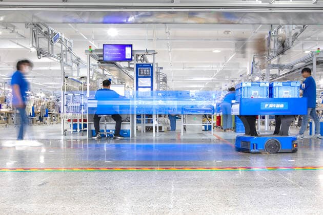 HANGZHOU, CHINA - SEPTEMBER 15: Employees work at the Xunxi Digital Factory on September 15, 2020 in Hangzhou, Zhejiang Province of China. Alibaba Group unveils its new manufacturing model - the Xunxi Digital Factory on Wednesday.  Copyright: xVCGx CFP111299057531
