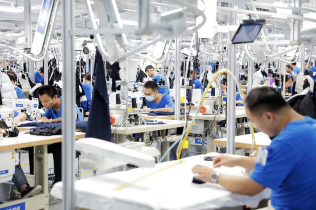 HANGZHOU, CHINA - SEPTEMBER 16: Employees work at the Xunxi Digital Factory on September 16, 2020 in Hangzhou, Zhejiang Province of China. Alibaba Group unveils its new manufacturing model - the Xunxi Digital Factory on Wednesday.  Copyright: xVCGx CFP111299066774