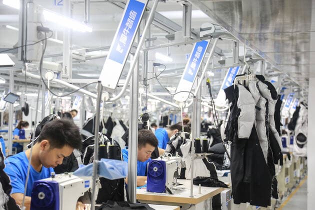 HANGZHOU, CHINA - SEPTEMBER 16: Employees work at the Xunxi Digital Factory on September 16, 2020 in Hangzhou, Zhejiang Province of China. Alibaba Group unveils its new manufacturing model - the Xunxi Digital Factory on Wednesday.  Copyright: xVCGx CFP111299078762
